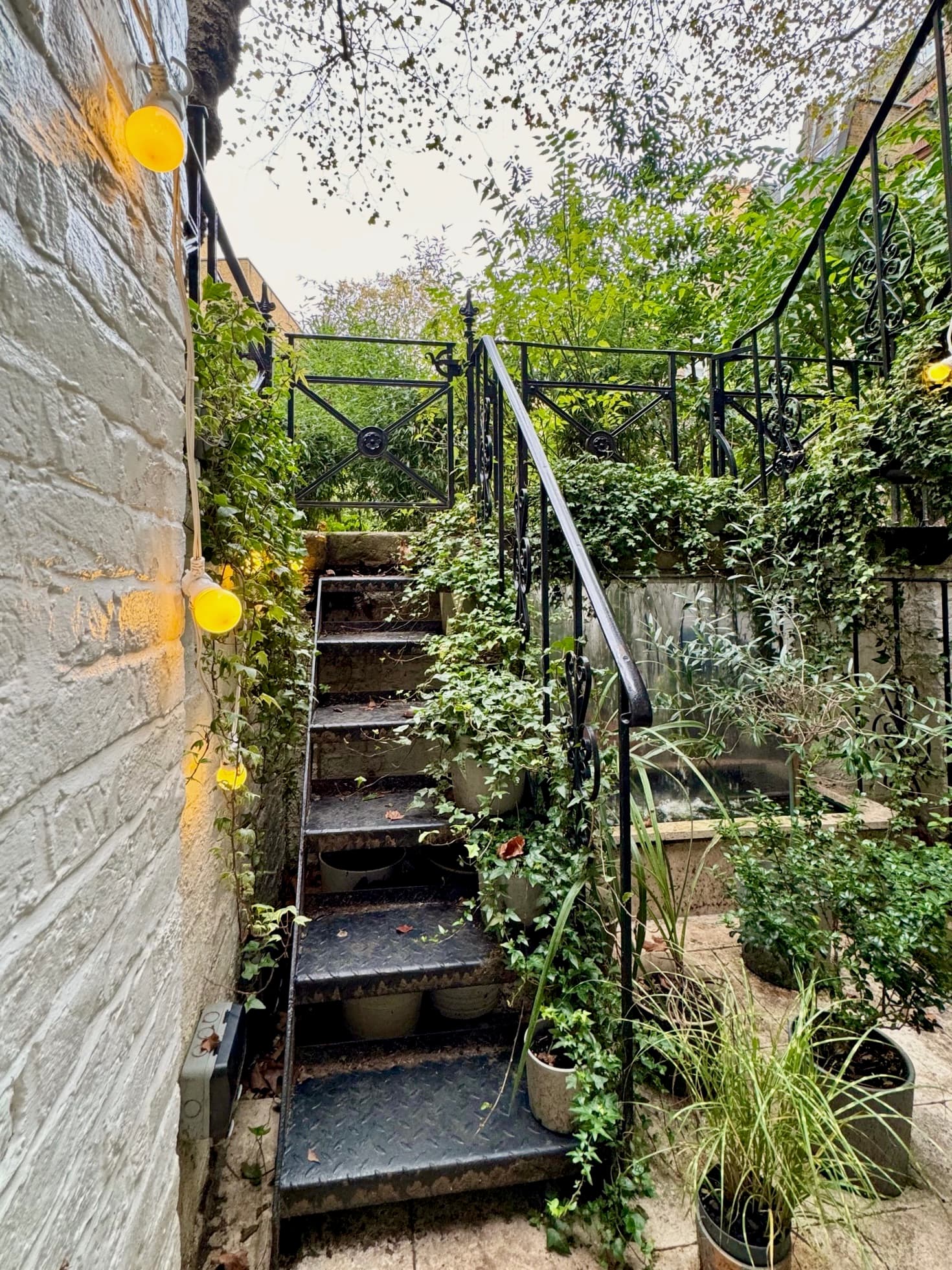 Steps from the living area down to the private patio